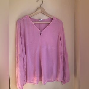 Barbie pink V neck blouse in ribbed fabrics for all occasions. Loose fit.